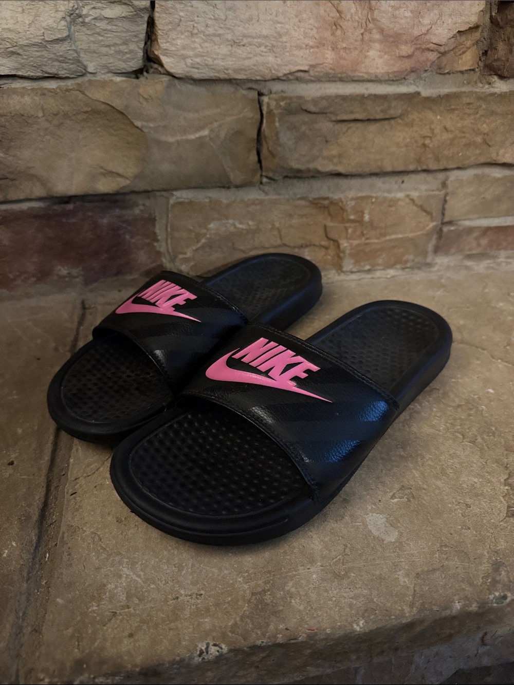 Nike Black Slides with Pink Swoosh Logo